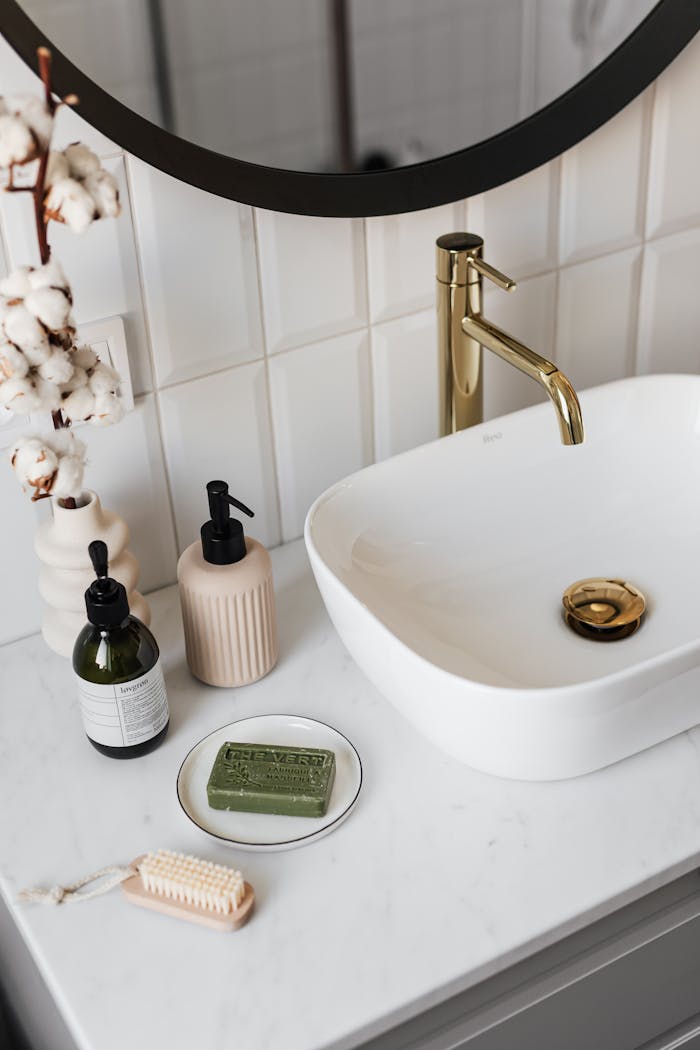 White Ceramic Sink with Stainless Steel Faucet